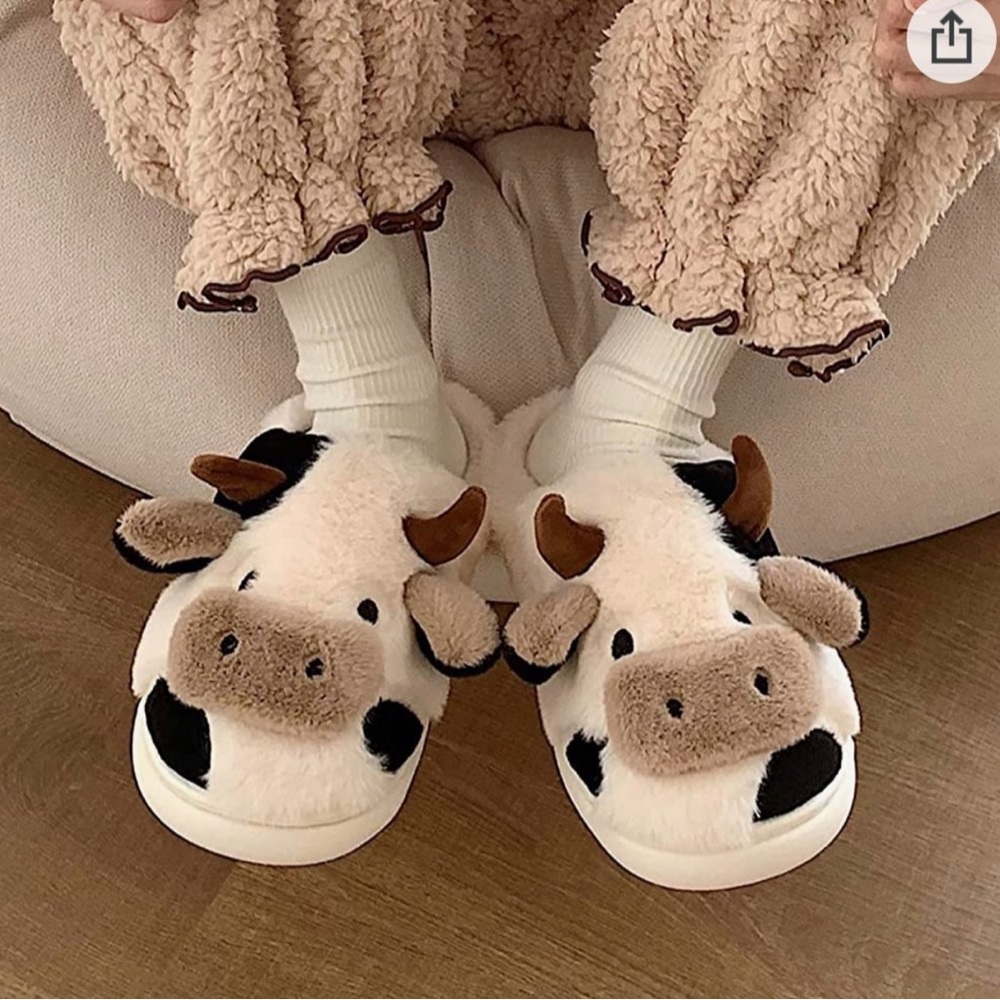Fluffy cow slippers